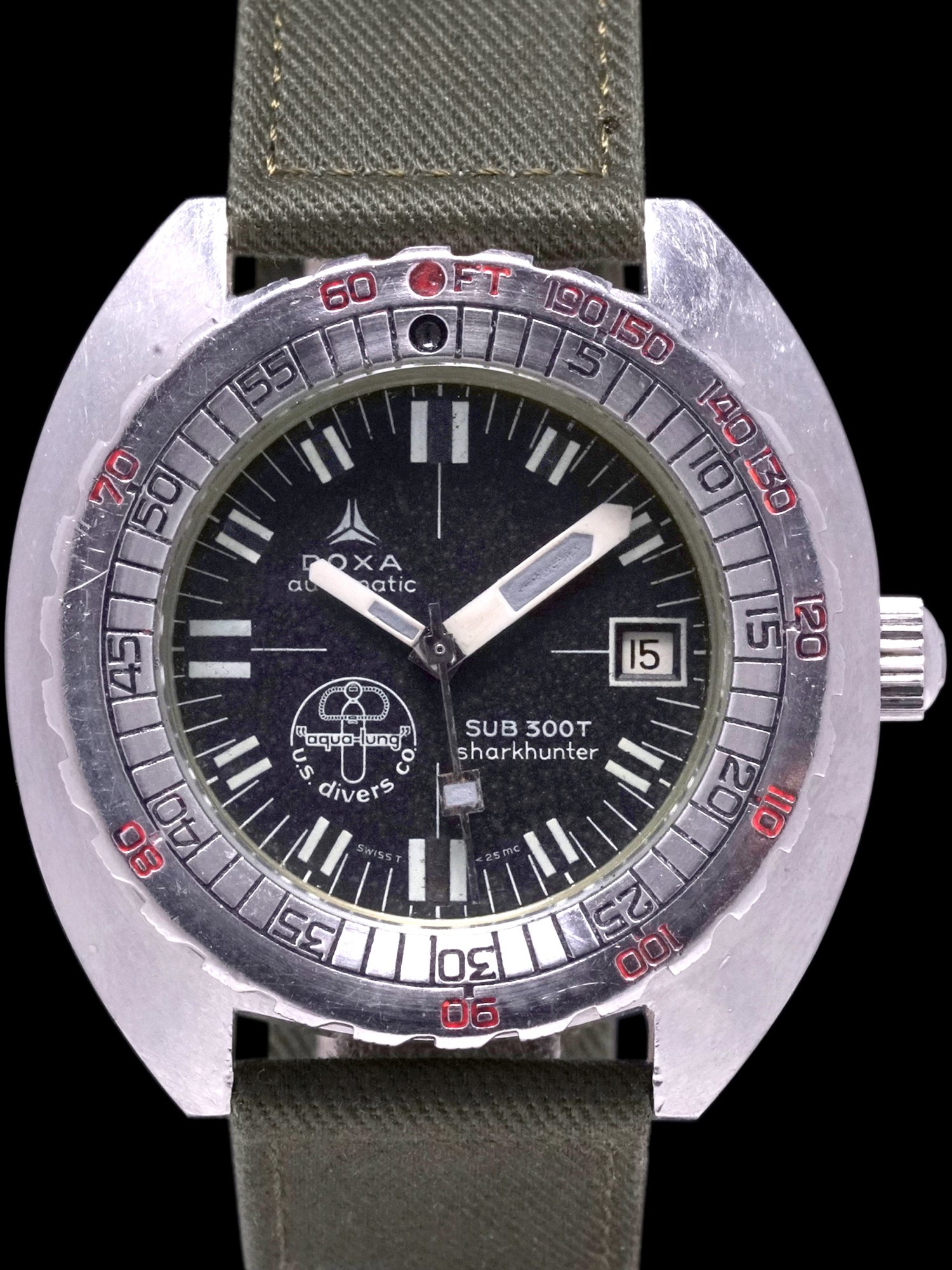 تصویر منبع؛ ساعت مچی DOXA Sub 300T Sharkhunter رفرنس 58098-59 دوره سینکرون با نشان Aqua-Lung