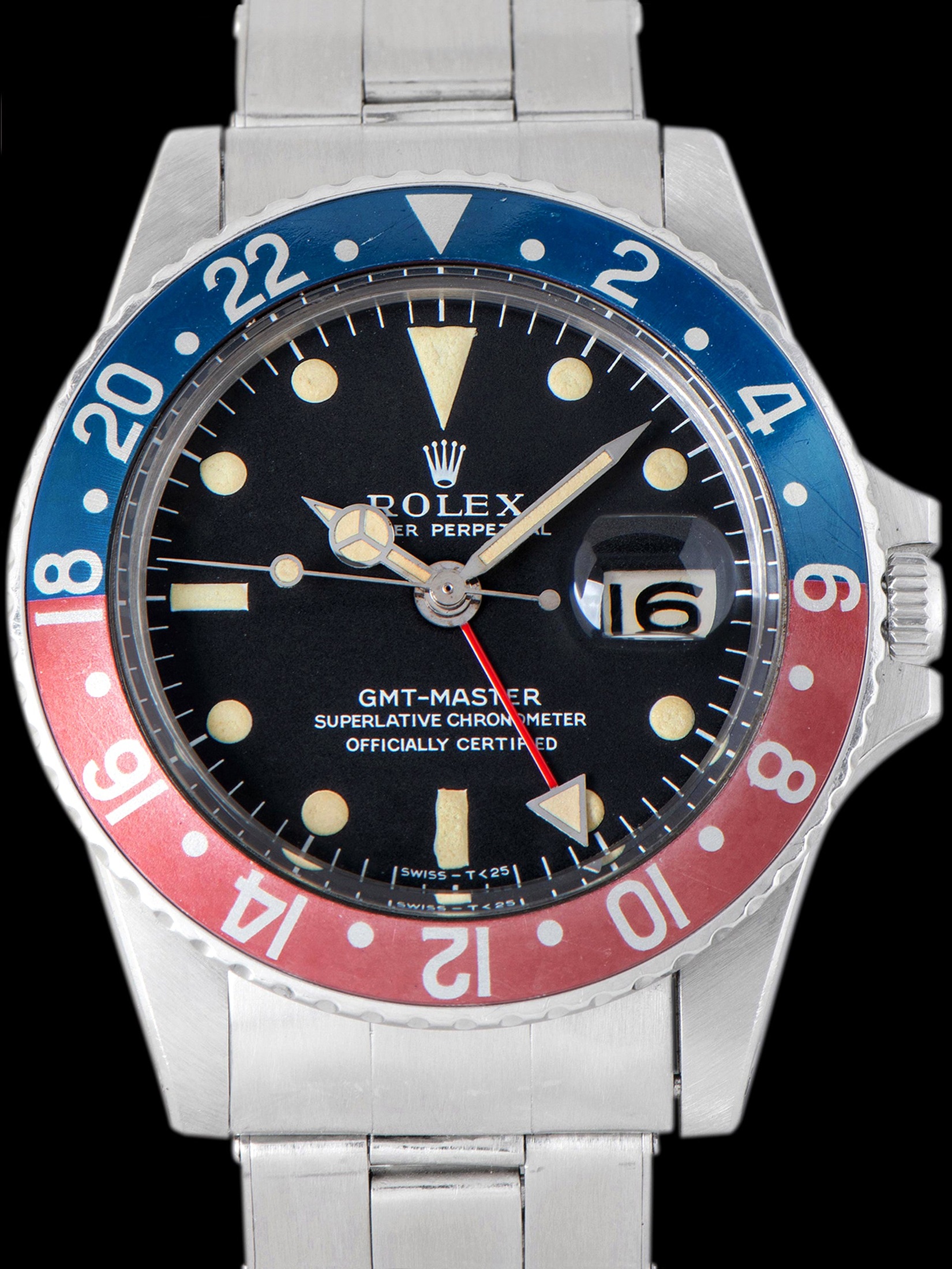 تصویر منبع؛ ساعت مچی Rolex GMT-Master مدل 1675 (نسخه 1967 با صفحه Mk. I "Long E")