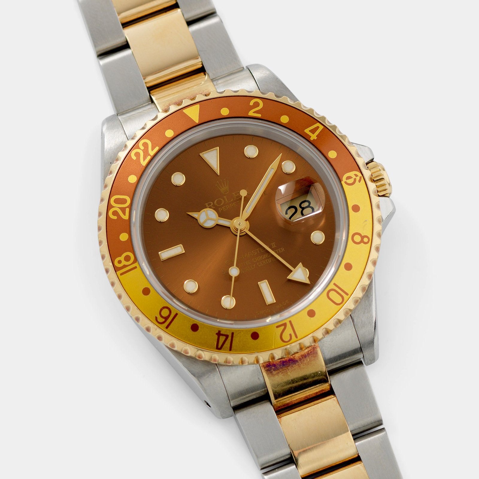 تصویر منبع؛ ساعت مچی Rolex مدل GMT-Master II رفرنس 16713 با صفحه قهوهای