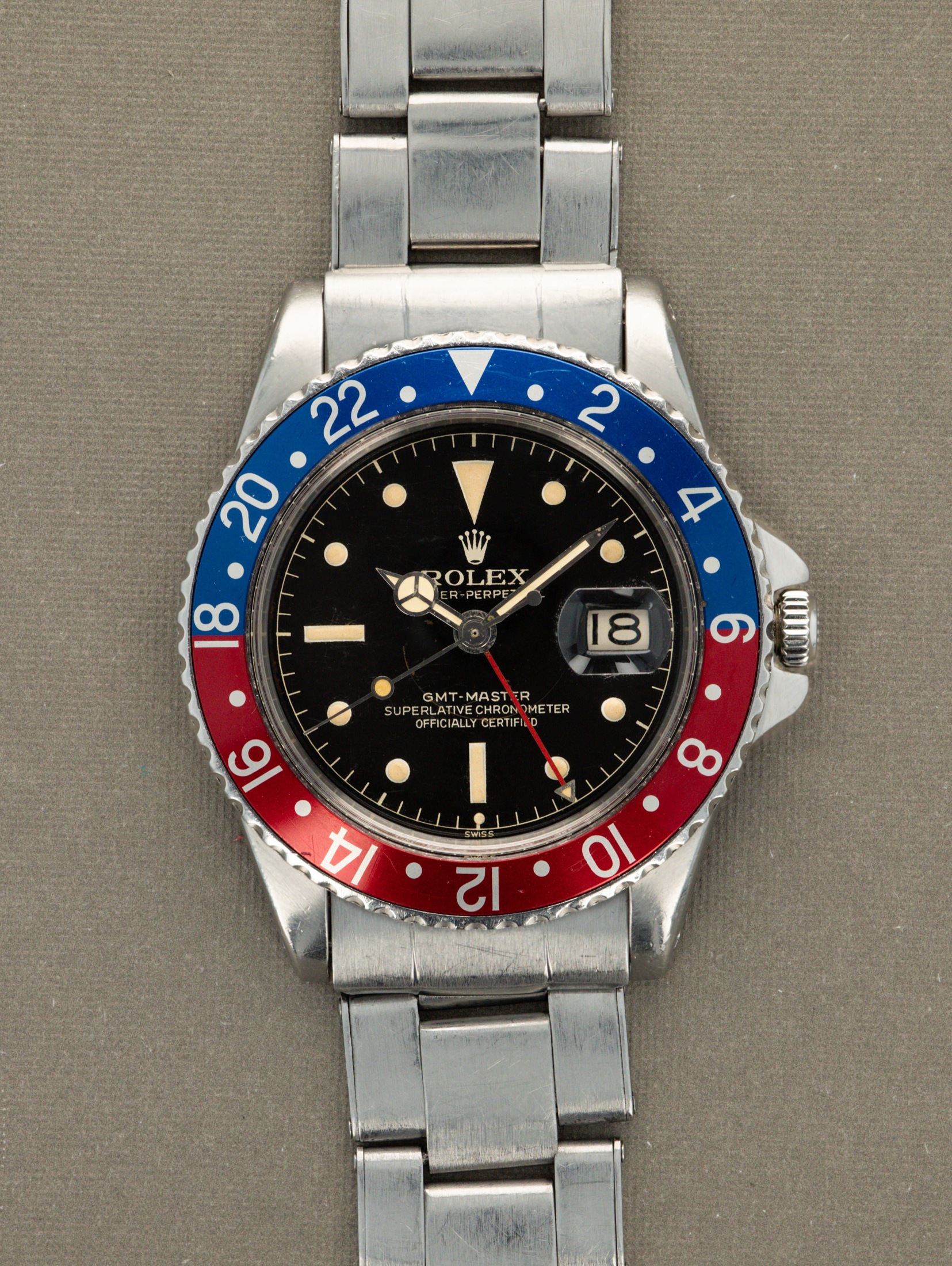 تصویر منبع؛ ساعت مچی Rolex GMT-Master رفرنس 1675 'PCG' با صفحه Gilt 'Chapter Ring'
