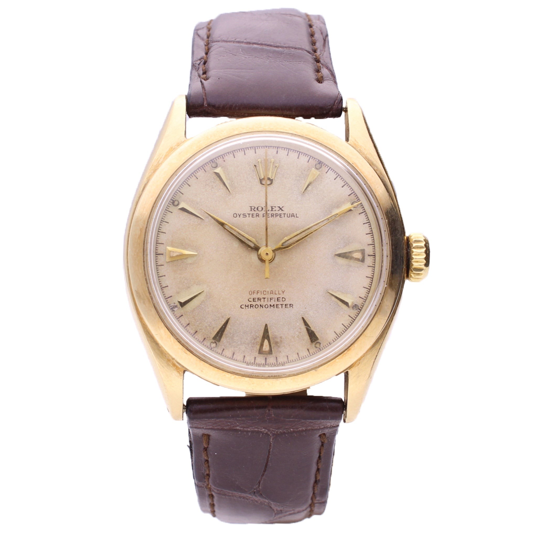 تصویر منبع؛ ساعت مچی Rolex Oyster Perpetual 'Bubble back' رفرنس 6048 از طلای زرد ۱۴ عیار، ۱۹۶۰