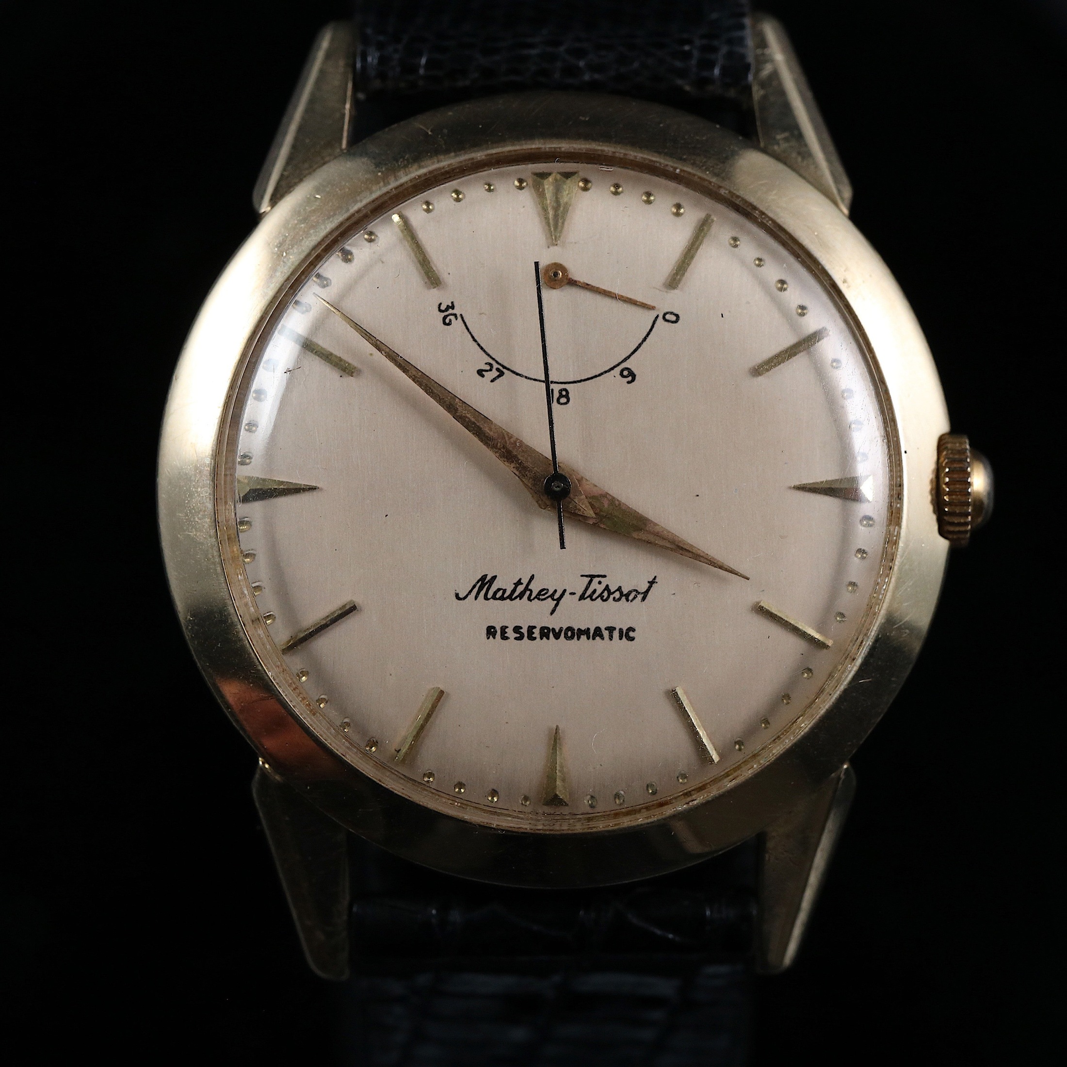 تصویر منبع؛ ساعت مچی Mathey Tissot Reservomatic - طلای ۱۴ عیار - دهه ۱۹۶۰
