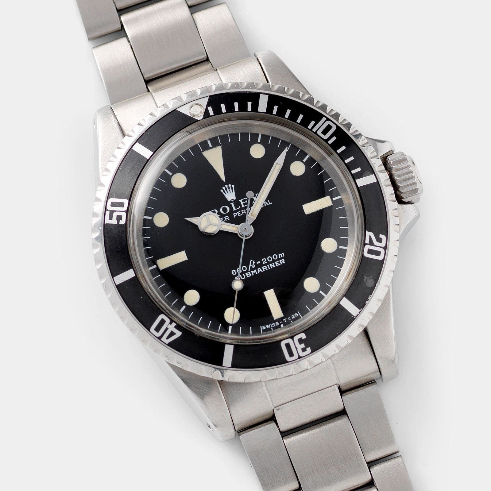 تصویر منبع؛ ساعت مچی رولکس Rolex Submariner رفرنس 5513 با صفحه Non-Serif و ست کامل
