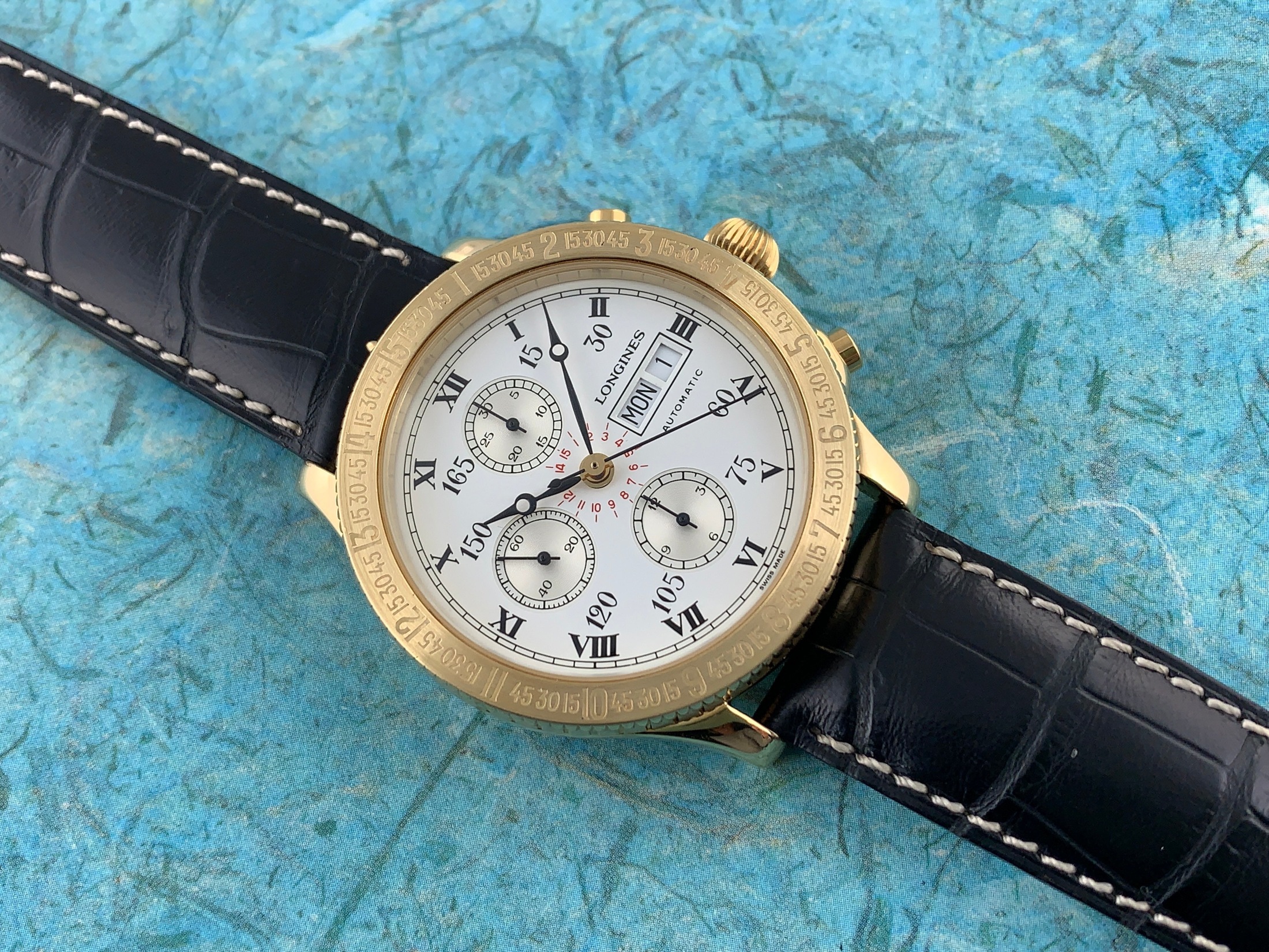 تصویر منبع؛ ساعت مچی Longines Lindbergh Hour Angle Chronograph مدل L26026 از طلای ۱۸ عیار