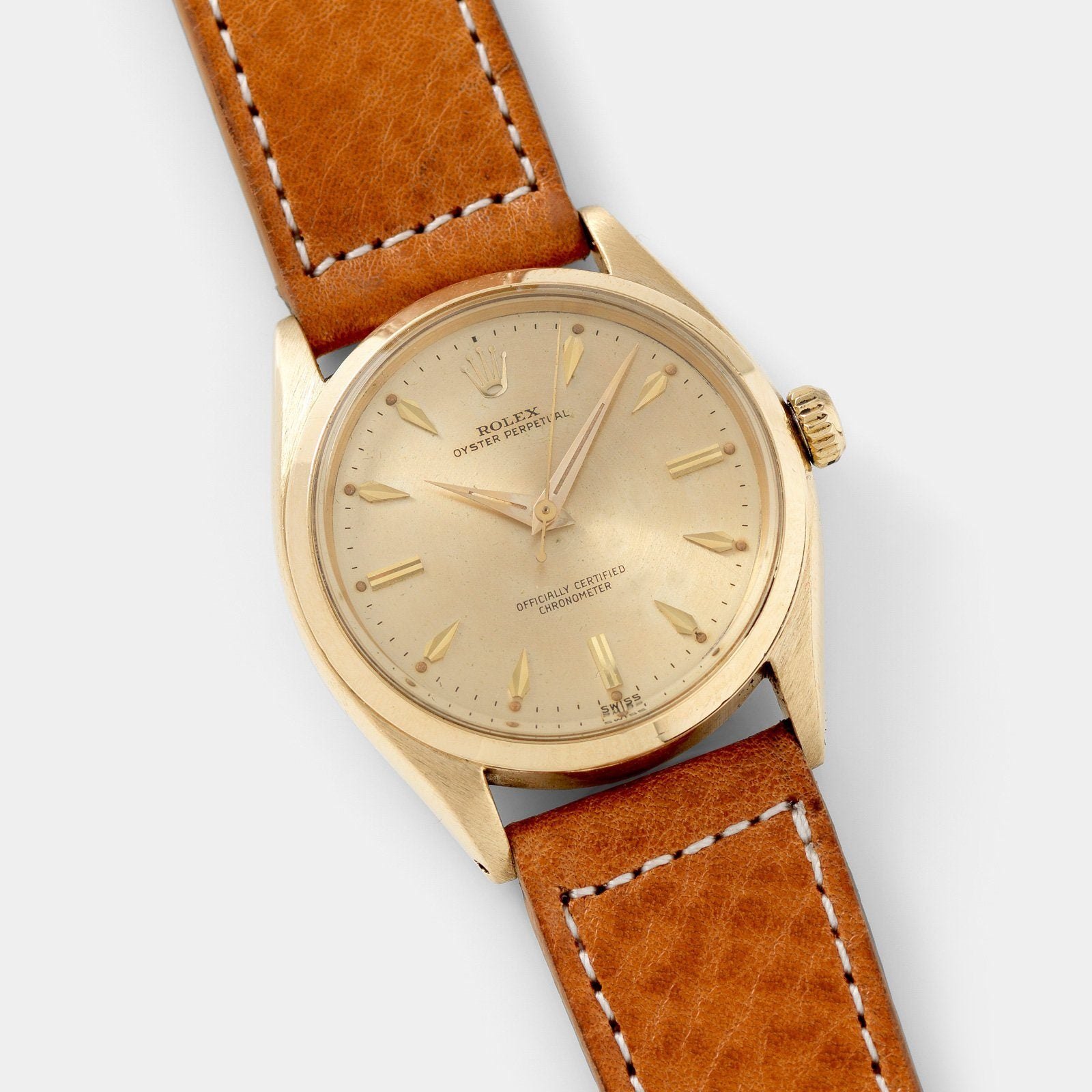 تصویر منبع؛ ساعت مچی Rolex Oyster Perpetual رفرنس 6564 از طلای زرد ۱۸ عیار