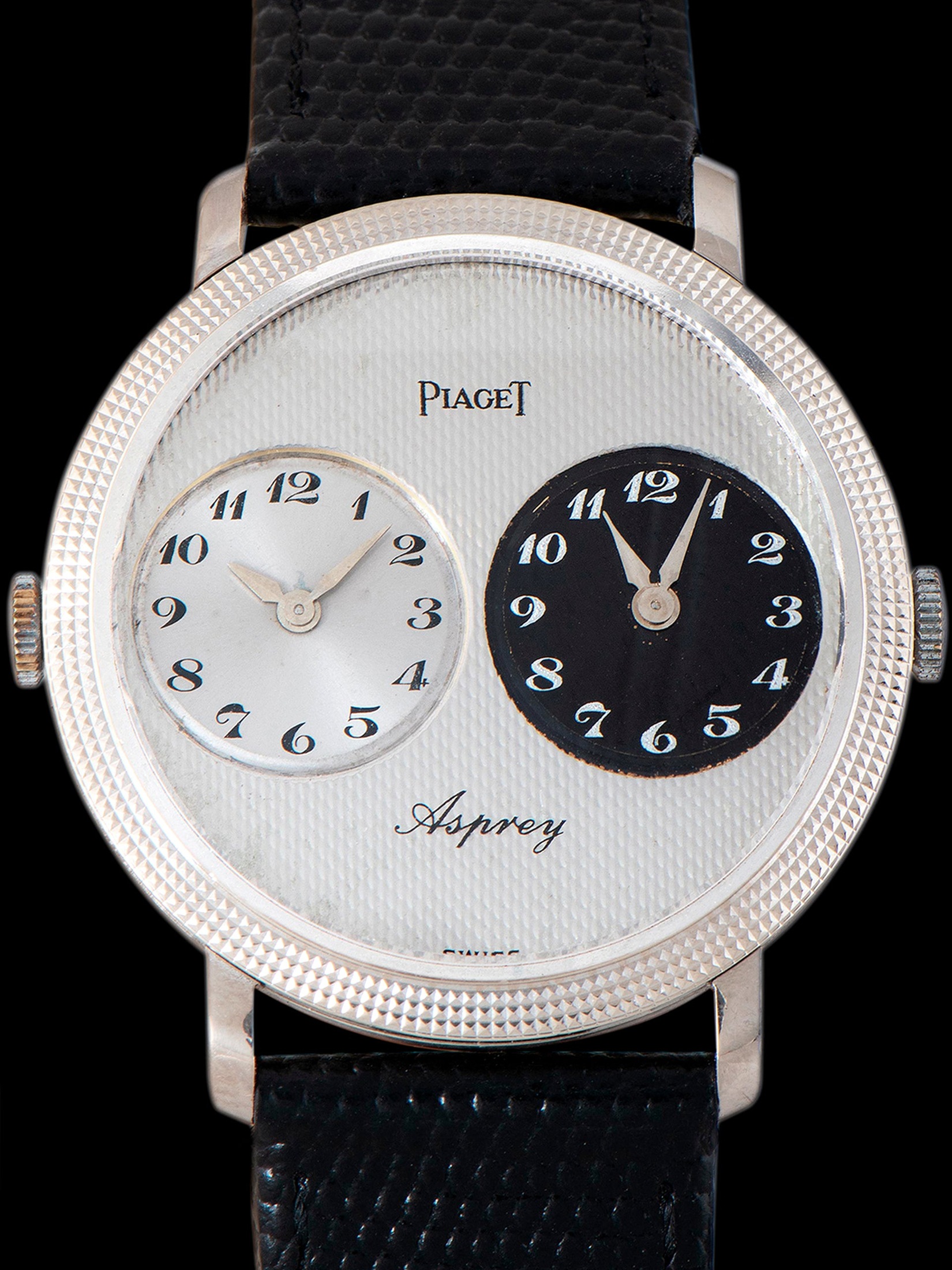 تصویر منبع؛ ساعت Piaget Altiplano Dual Time 18K WG (Ref. 612104) با صفحه Guilloché و امضای Asprey