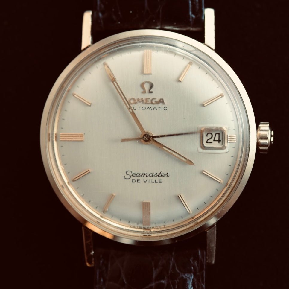 تصویر منبع؛ ساعت مچی مردانه اتوماتیک Omega Seamaster De Ville تقویمدار با روکش طلا