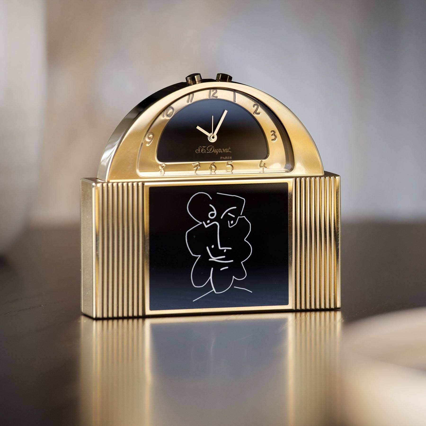 تصویر منبع؛ ساعت رومیزی و زنگدار S.T. Dupont مدل Picasso Secret Clock