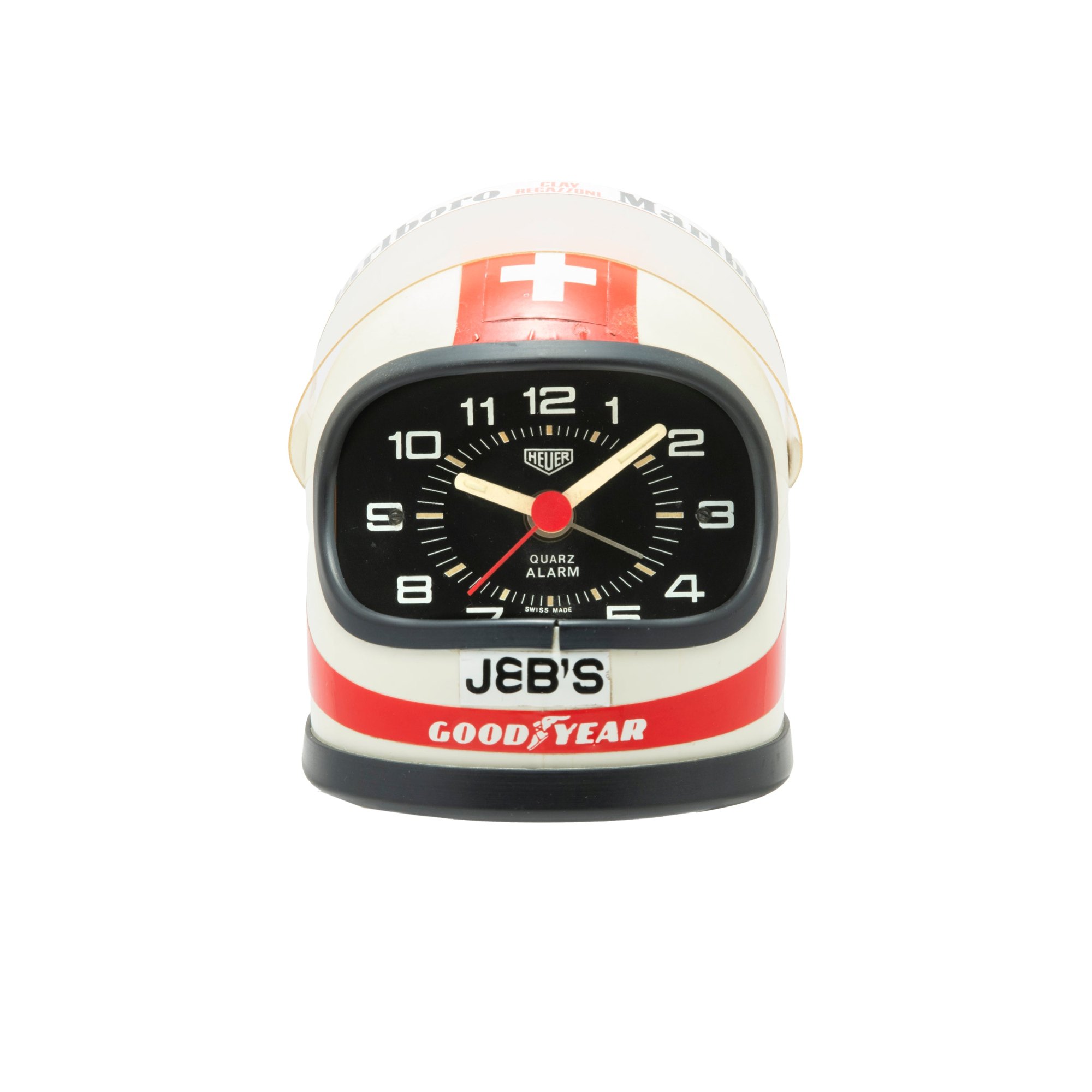 تصویر منبع؛ ساعت رومیزی و زنگدار Heuer مدل Helmet Desk Clock طرح کلاه ایمنی Clay Regazzoni