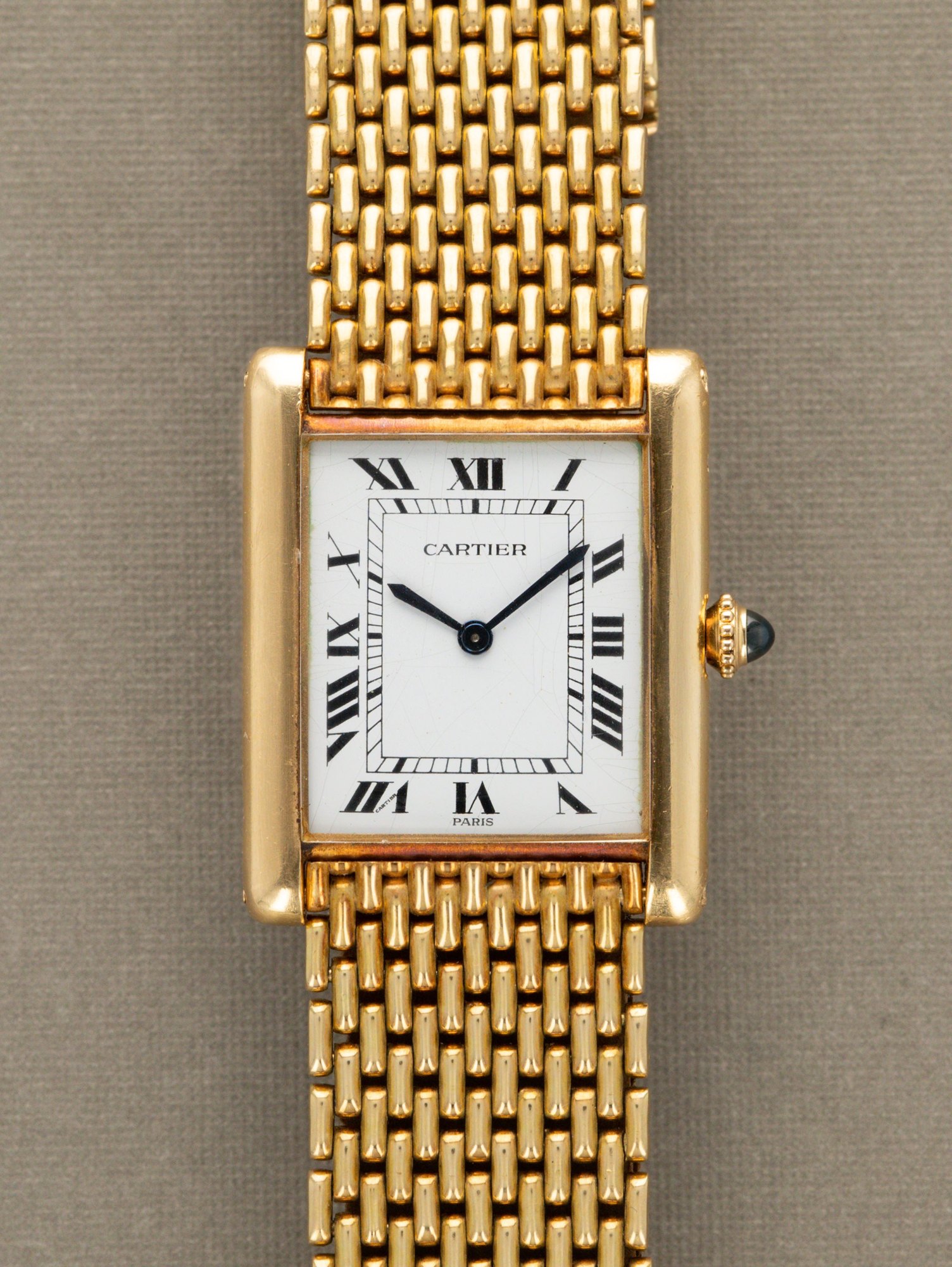 تصویر منبع؛ ساعت مچی Cartier Tank Louis رفرنس 96065 نسخه Extra Plate با دستبند Grain de Riz