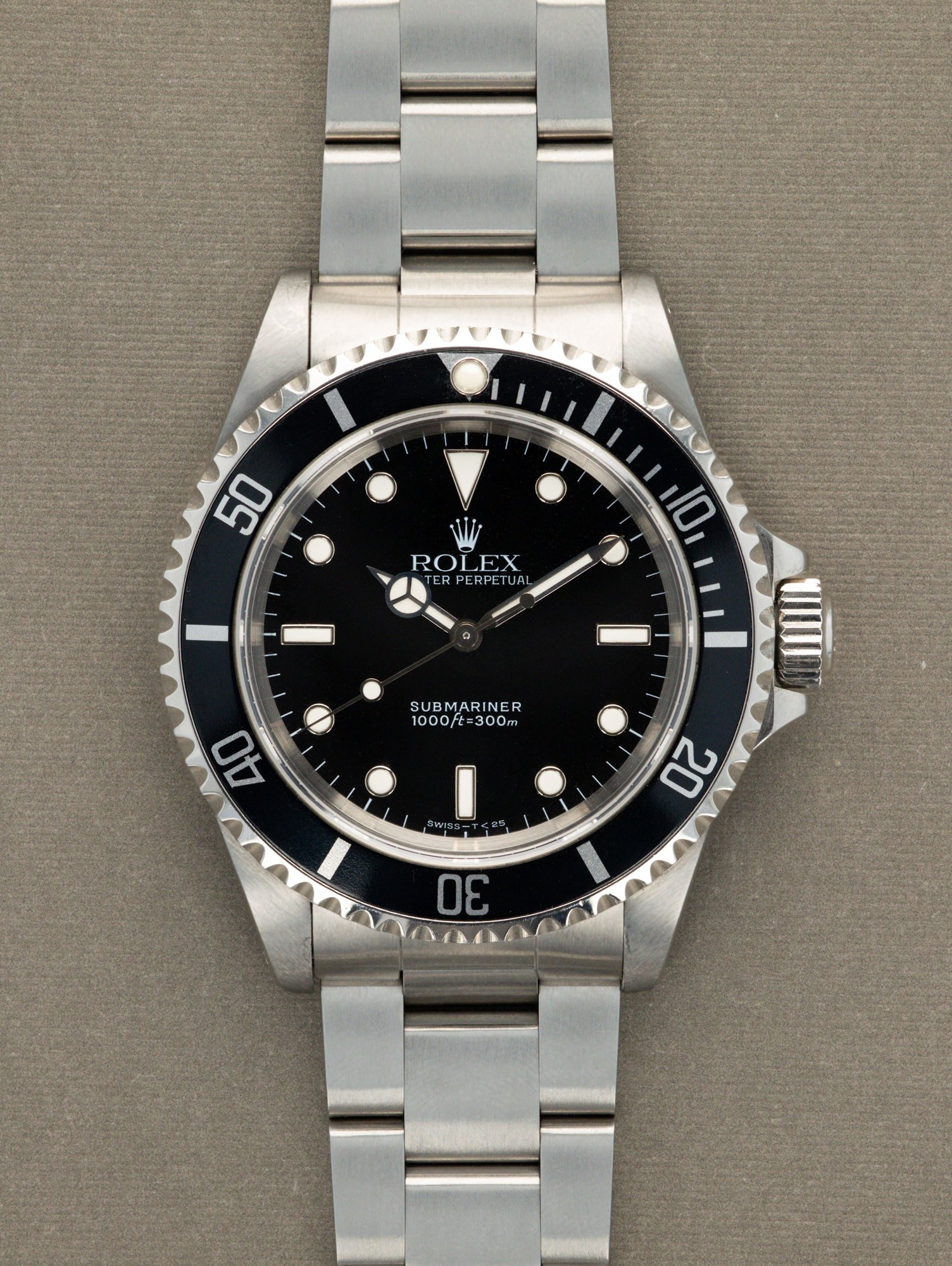 تصویر منبع؛ ساعت مچی Rolex Submariner رفرنس 14060 صفحه تریتیوم